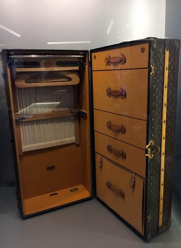 A Louis Vuitton wardrobe trunk, covered in LV monogram canvas and